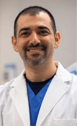 Dr. Dmitriy Fuzaylov, board-certified pain management physician at Queens Pain Clinic in Rego Park, NY.